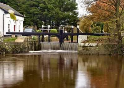 Water spilling over the lock gates at Clogrennan Lock on river Barrow in Carlow. A reselt of flooding on the Barrow