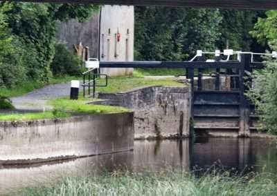 View of Rathvindon lockhouse and lock on the river Barrow in Carlow, Ireland.