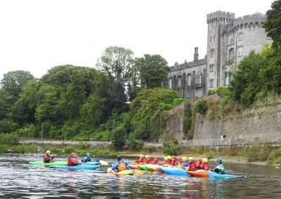 Group of trainee kayakers on river Nore in Kilkenny