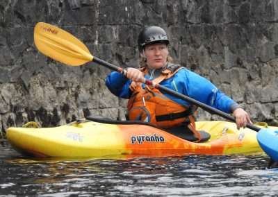 Instructor in yellow kayak in Kilkenny