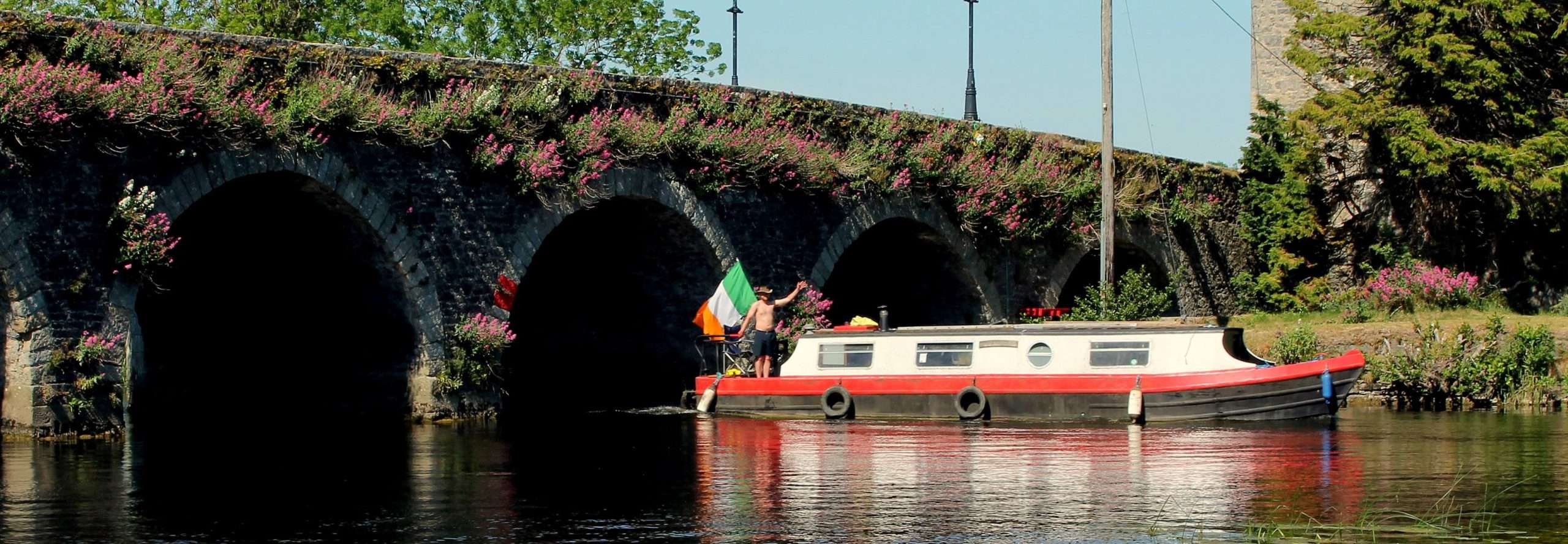 Cliff Reid on his barge on the river Barrow at Goresbridge, Kilkenny, Ireland