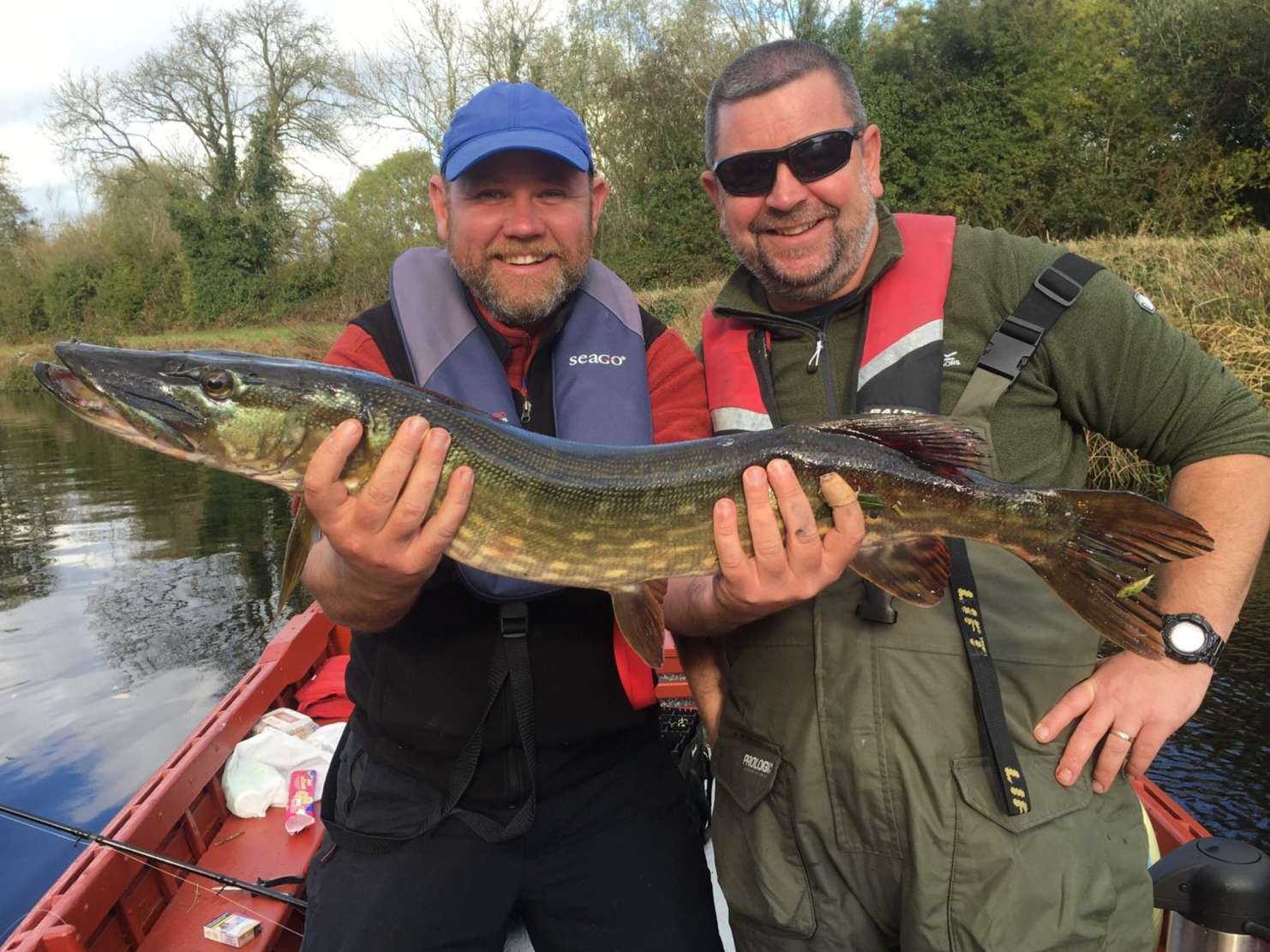 Clifford Reid and John Creaney with a Pike on the river Barrow