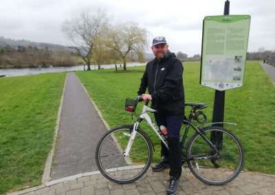 Cliff Reid on a bicycle at start of Suir Blueway in Carrick-on-Suir
