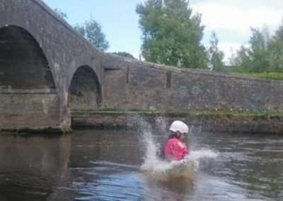 Clifford Reid splashing into river Barrow after jumping off the horse bridge